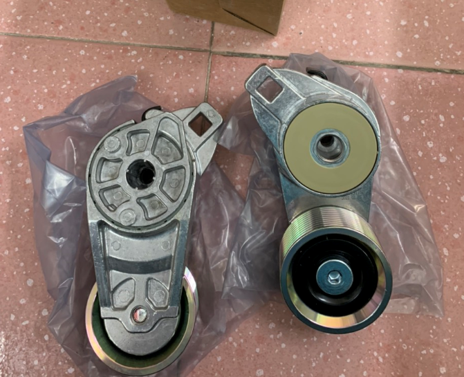 Bu li dây cu roa máy xúc volvo, VOE21145261 Belt Tensioner Pulley for  Ec360 Ec460  20491753 Volvo parts, phụ tùng máy xúc volvo, phụ tùng máy công trình volvo